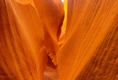 Image of a canyon in Arizona, orange light at sunset